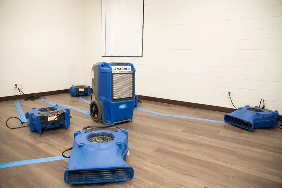 LGR dehumidifier and low-profile air movers drying a room in Palmdale